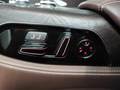 View of control buttons for electric rear seat adjustment