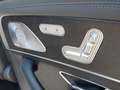 View of control buttons for electric rear seat adjustment
