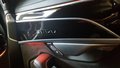 View of control buttons for electric rear seat adjustment