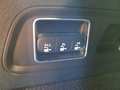 View of control buttons for electric rear seat adjustment