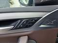 View of control buttons for electric seat adjustment