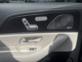 View of control buttons for electric rear seat adjustment