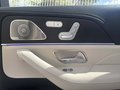 View of control buttons for electric rear seat adjustment