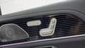 View of control buttons for electric rear seat adjustment
