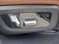 View of control buttons for electric rear seat adjustment