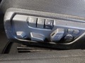 View of control buttons for electric seat adjustment