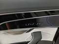 View of control buttons for electric rear seat adjustment