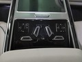 View of control buttons for electric rear seat adjustment