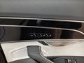 View of control buttons for electric rear seat adjustment