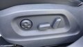 View of control buttons for electric seat adjustment