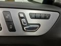 View of control buttons for electric seat adjustment