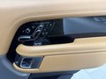 View of control buttons for electric rear seat adjustment