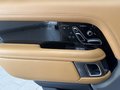 View of control buttons for electric rear seat adjustment