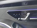 View of control buttons for electric rear seat adjustment