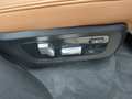 View of control buttons for electric rear seat adjustment