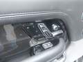 View of control buttons for electric rear seat adjustment