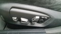 View of control buttons for electric seat adjustment