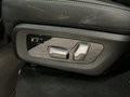 View of control buttons for electric rear seat adjustment