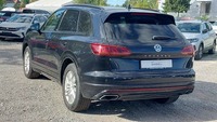 Вид сзади слева