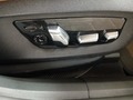 View of control buttons for electric seat adjustment