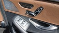 View of control buttons for electric rear seat adjustment