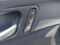 View of control buttons for electric seat adjustment
