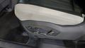 View of control buttons for electric rear seat adjustment