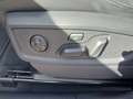 View of control buttons for electric rear seat adjustment