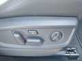 View of control buttons for electric rear seat adjustment