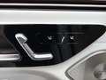 View of control buttons for electric rear seat adjustment