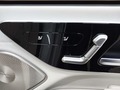 View of control buttons for electric rear seat adjustment