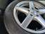 спереди слева