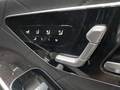 View of control buttons for electric rear seat adjustment