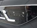View of control buttons for electric rear seat adjustment