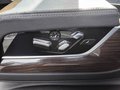View of control buttons for electric rear seat adjustment