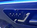 View of control buttons for electric rear seat adjustment