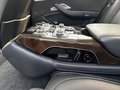 View of control buttons for electric rear seat adjustment