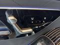 View of control buttons for electric rear seat adjustment