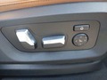 View of control buttons for electric seat adjustment