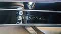 View of control buttons for electric rear seat adjustment