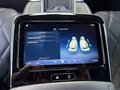 View of control buttons for electric rear seat adjustment