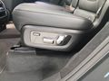 View of control buttons for electric rear seat adjustment