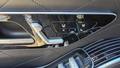 View of control buttons for electric rear seat adjustment