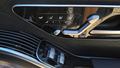 View of control buttons for electric rear seat adjustment