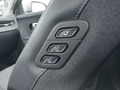 View of control buttons for electric rear seat adjustment