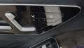 View of control buttons for electric rear seat adjustment