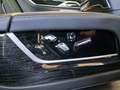 View of control buttons for electric rear seat adjustment