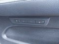 Vue des boutons de commande des sièges électriques arrière