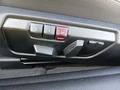 View of control buttons for electric seat adjustment