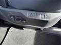 View of control buttons for electric rear seat adjustment